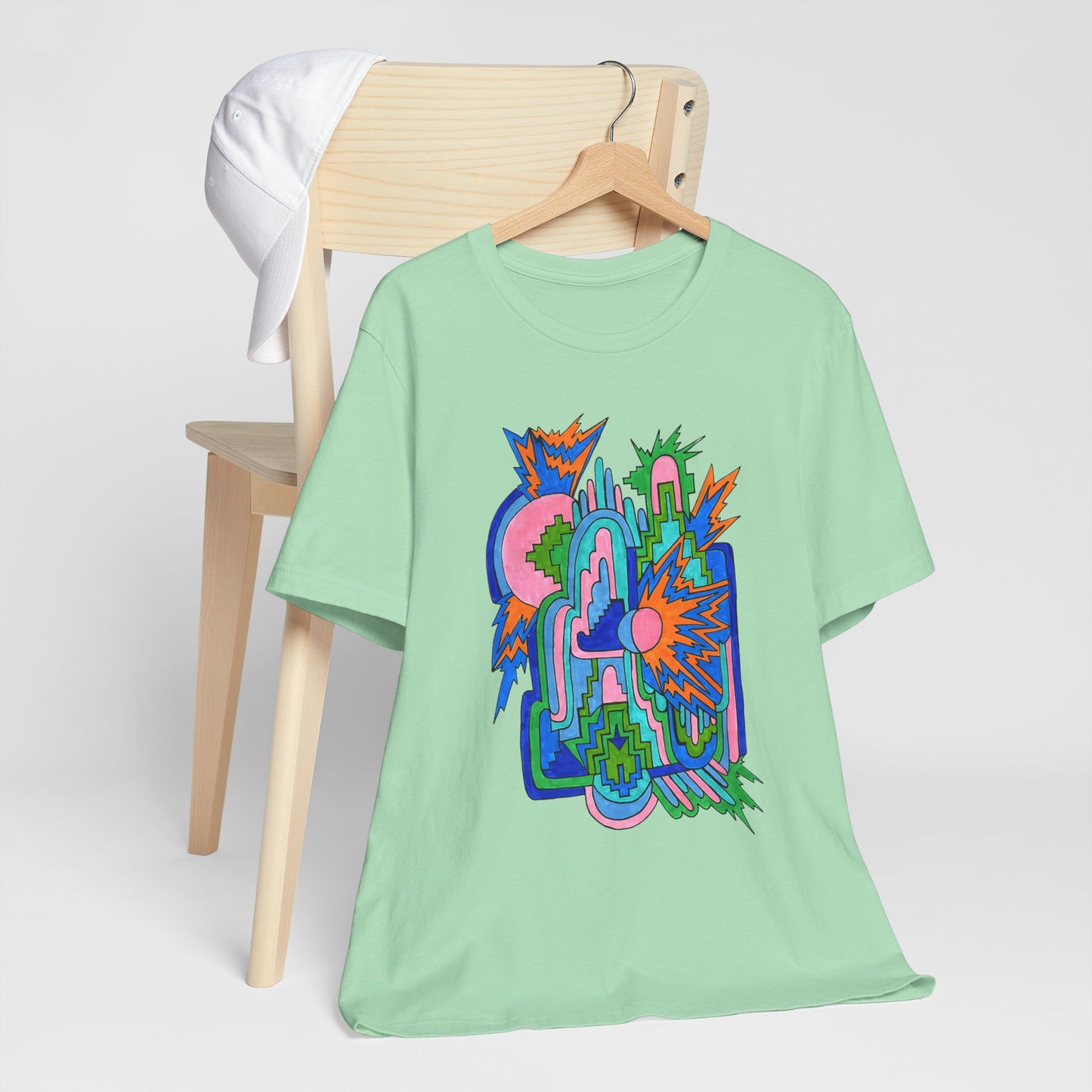 Cosmic Pulse Moon Drop Tee in Mint — Mystic Quarterly unisex t-shirt featuring intuitive lunar art print design